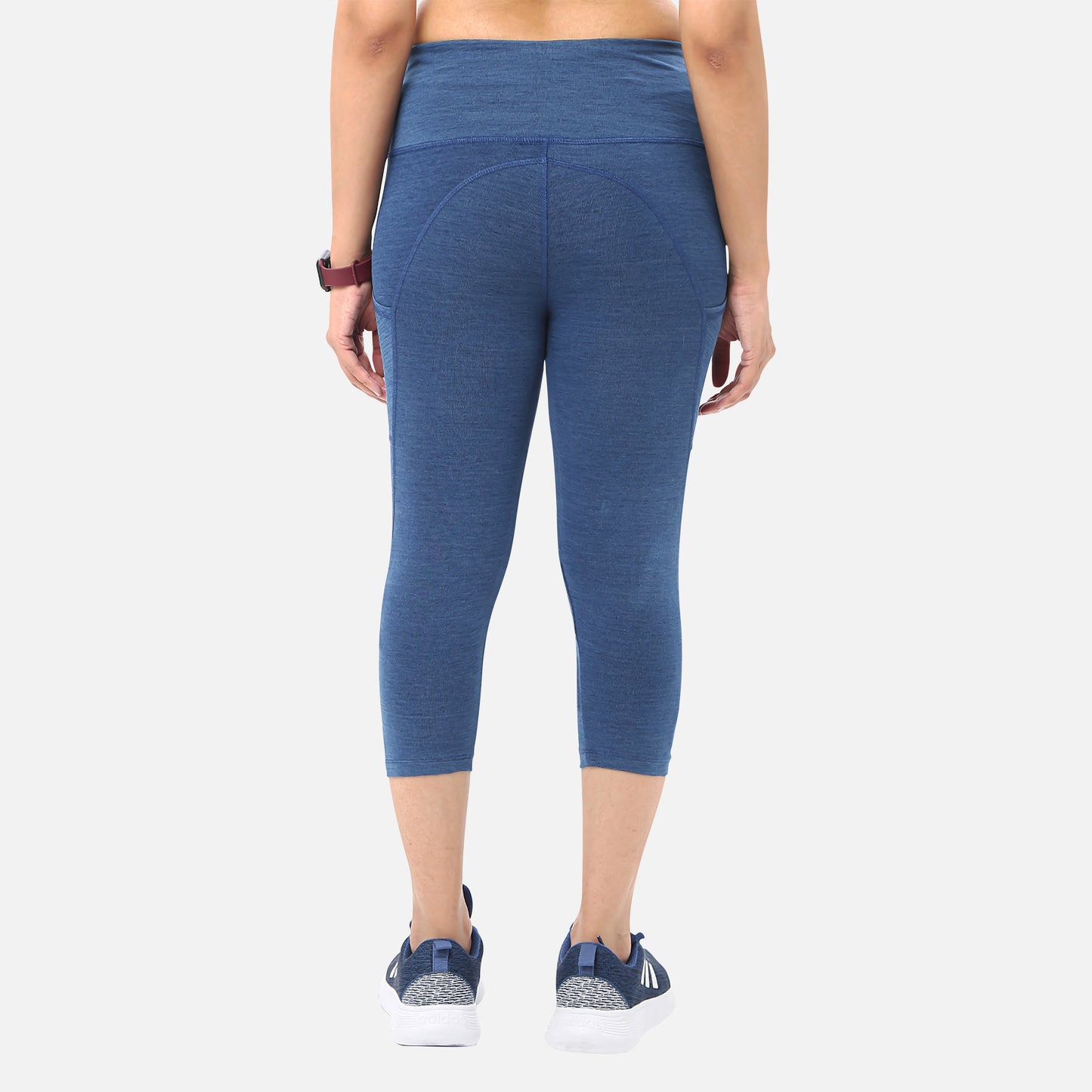 Casual womens knitted mid-blue denim yoga capris with pockets, perfect for adding functionality and style to your workout wardrobe, available online