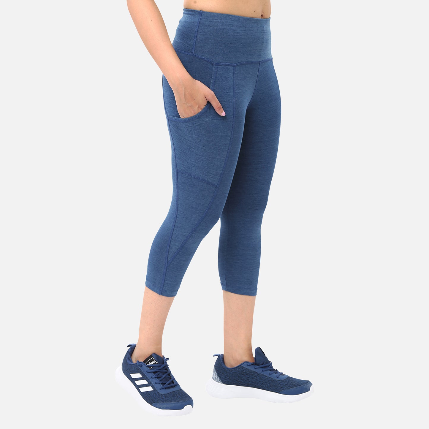 Casual womens knitted mid-blue denim yoga capris with pockets, perfect for adding functionality and style to your workout wardrobe, available online