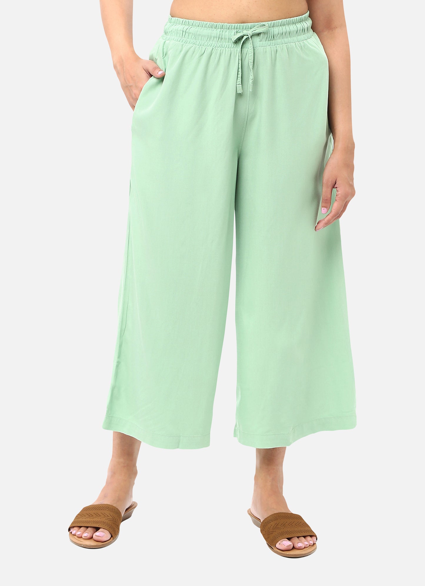 Womens coolatts in a refreshing light green shade, providing a chic and vibrant look, available online