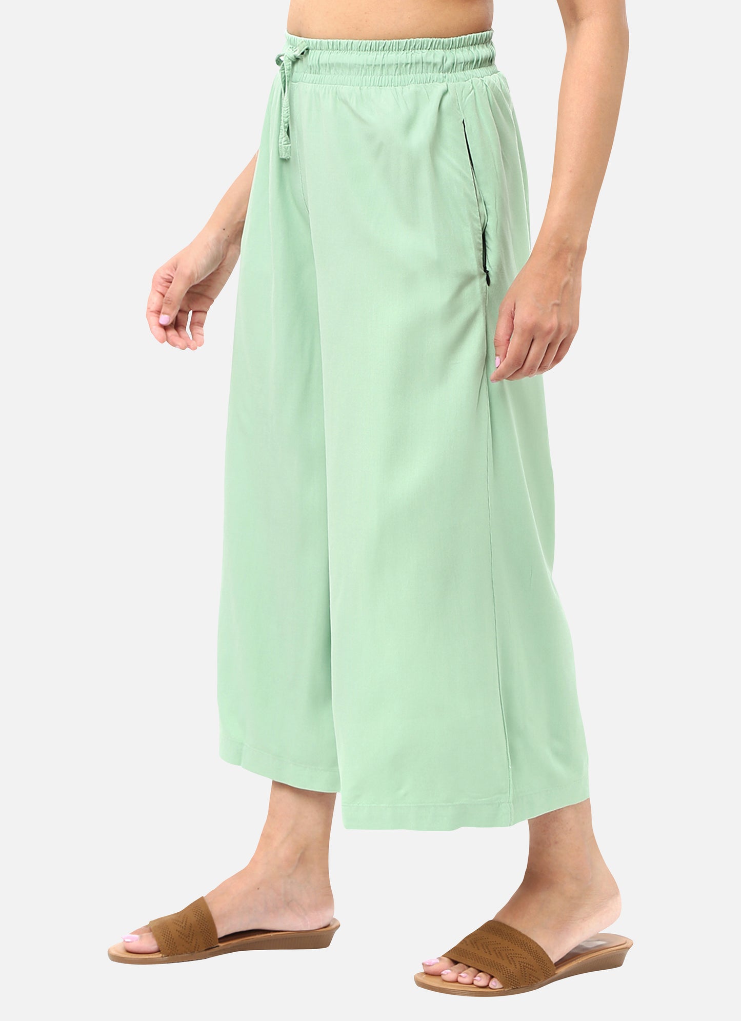 Womens coolatts in a refreshing light green shade, providing a chic and vibrant look, available online