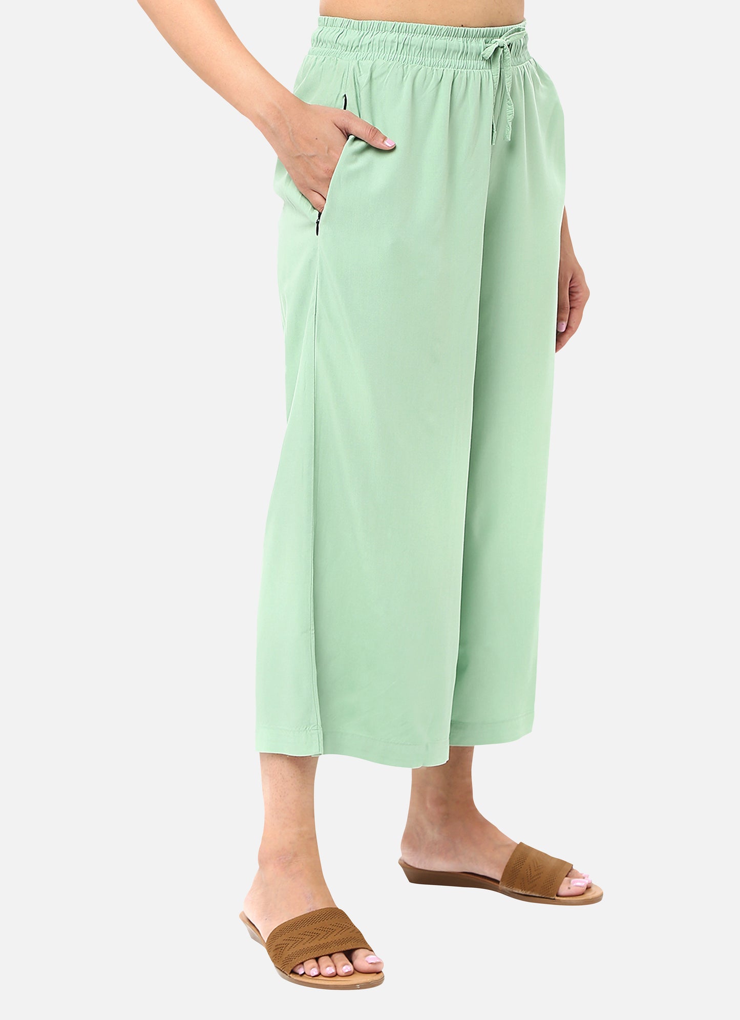 Womens coolatts in a refreshing light green shade, providing a chic and vibrant look, available online
