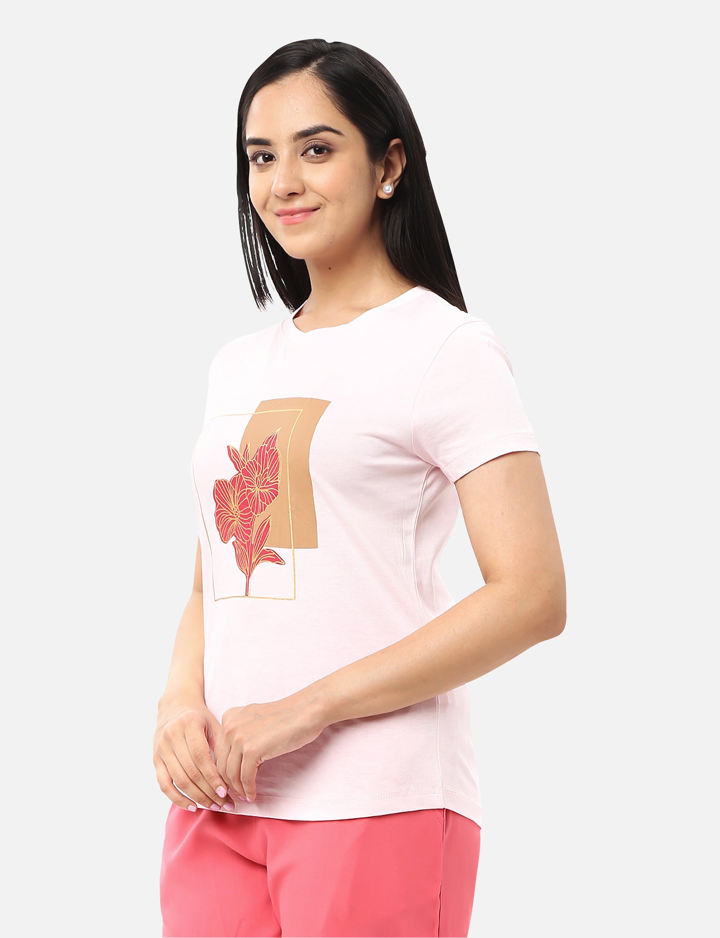 Stylish pink T-shirt for women with a gold foil message and red floral design, ideal for a unique and elegant look, available online