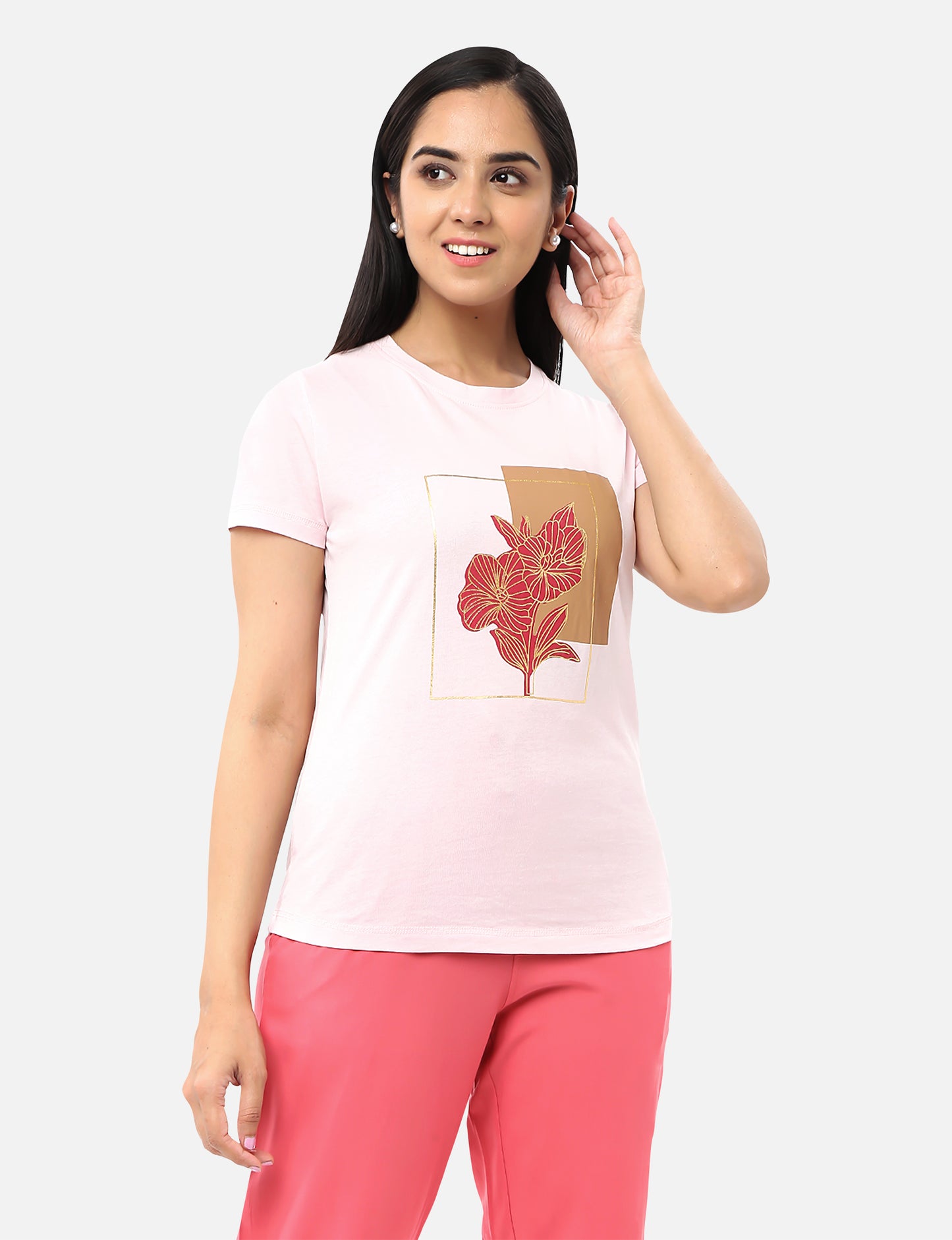 Stylish pink T-shirt for women with a gold foil message and red floral design, ideal for a unique and elegant look, available online