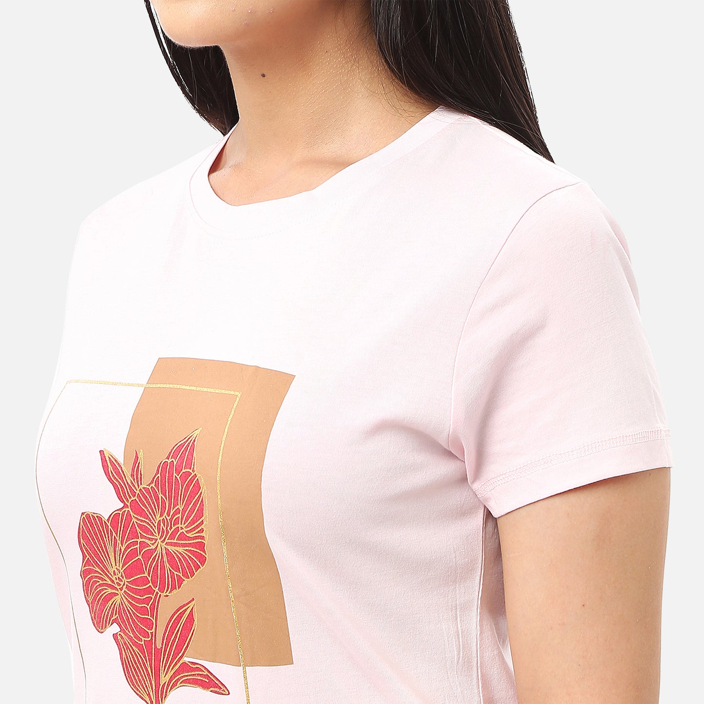 Stylish pink T-shirt for women with a gold foil message and red floral design, ideal for a unique and elegant look, available online
