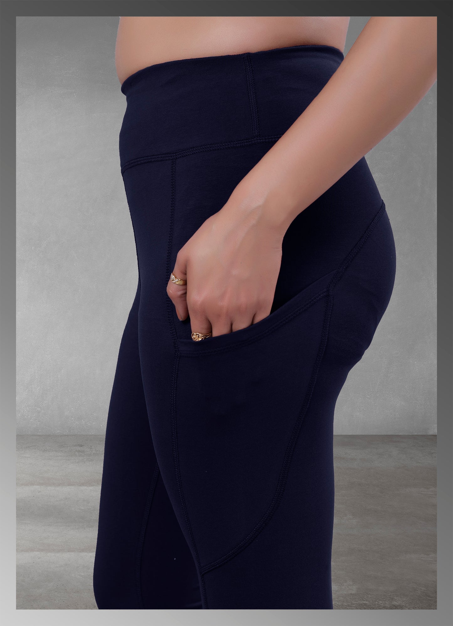 Women's navy pocket yoga wear available online, featuring a comfortable and functional design ideal for active lifestyles