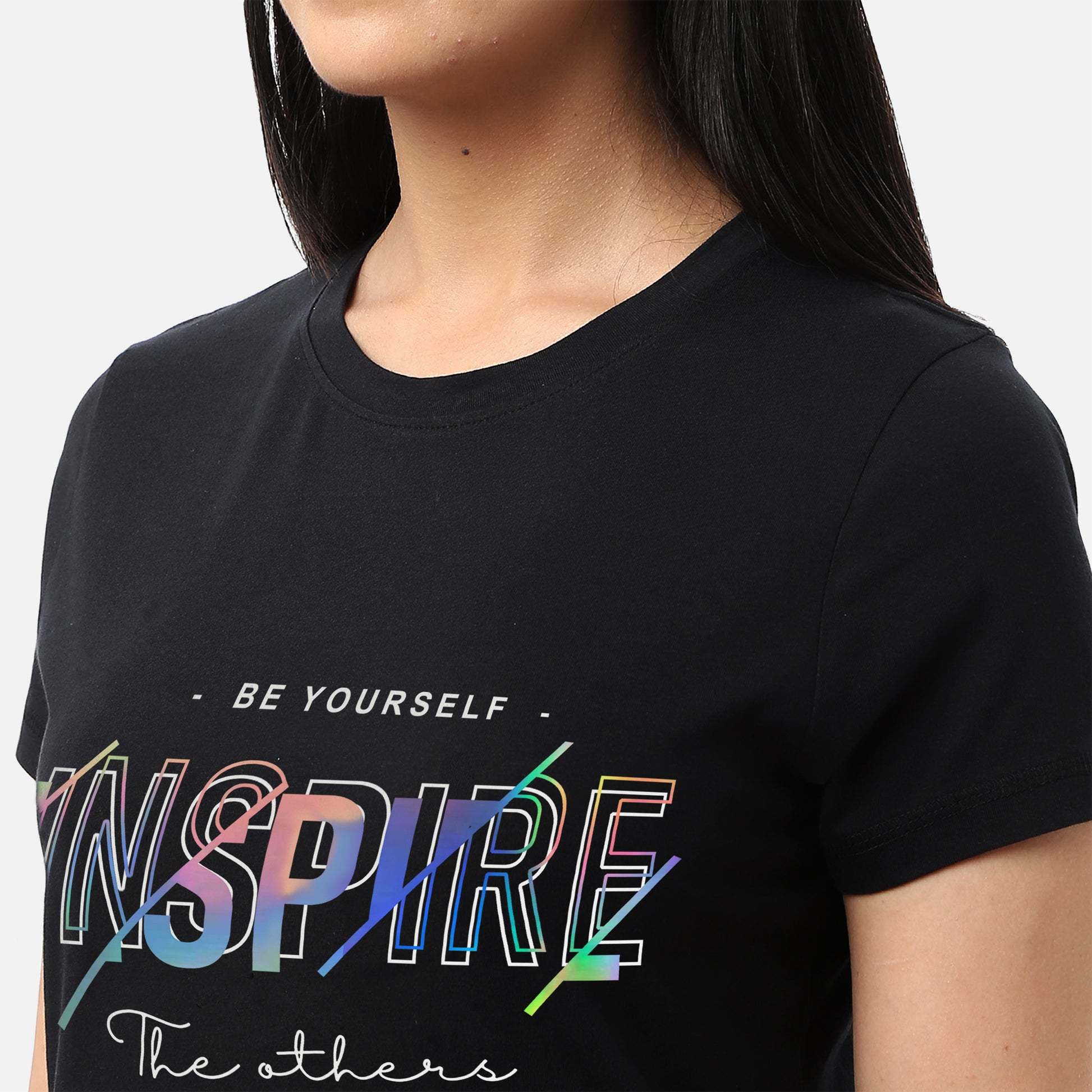 Womens black T-shirt with rainbow foil 'inspire' design, offering a bold and motivational look, available online