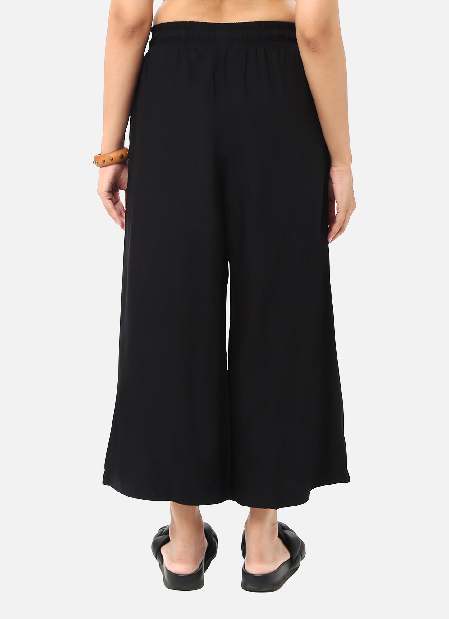 Womens bottom wear in deep black, designed for a chic and adaptable style, ideal for a range of occasions, available online
