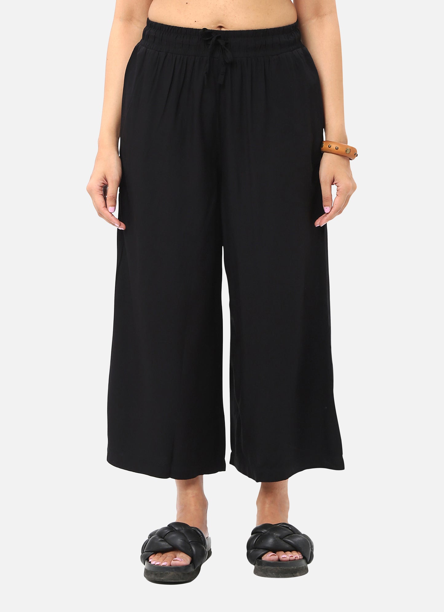 Womens bottom wear in deep black, designed for a chic and adaptable style, ideal for a range of occasions, available online