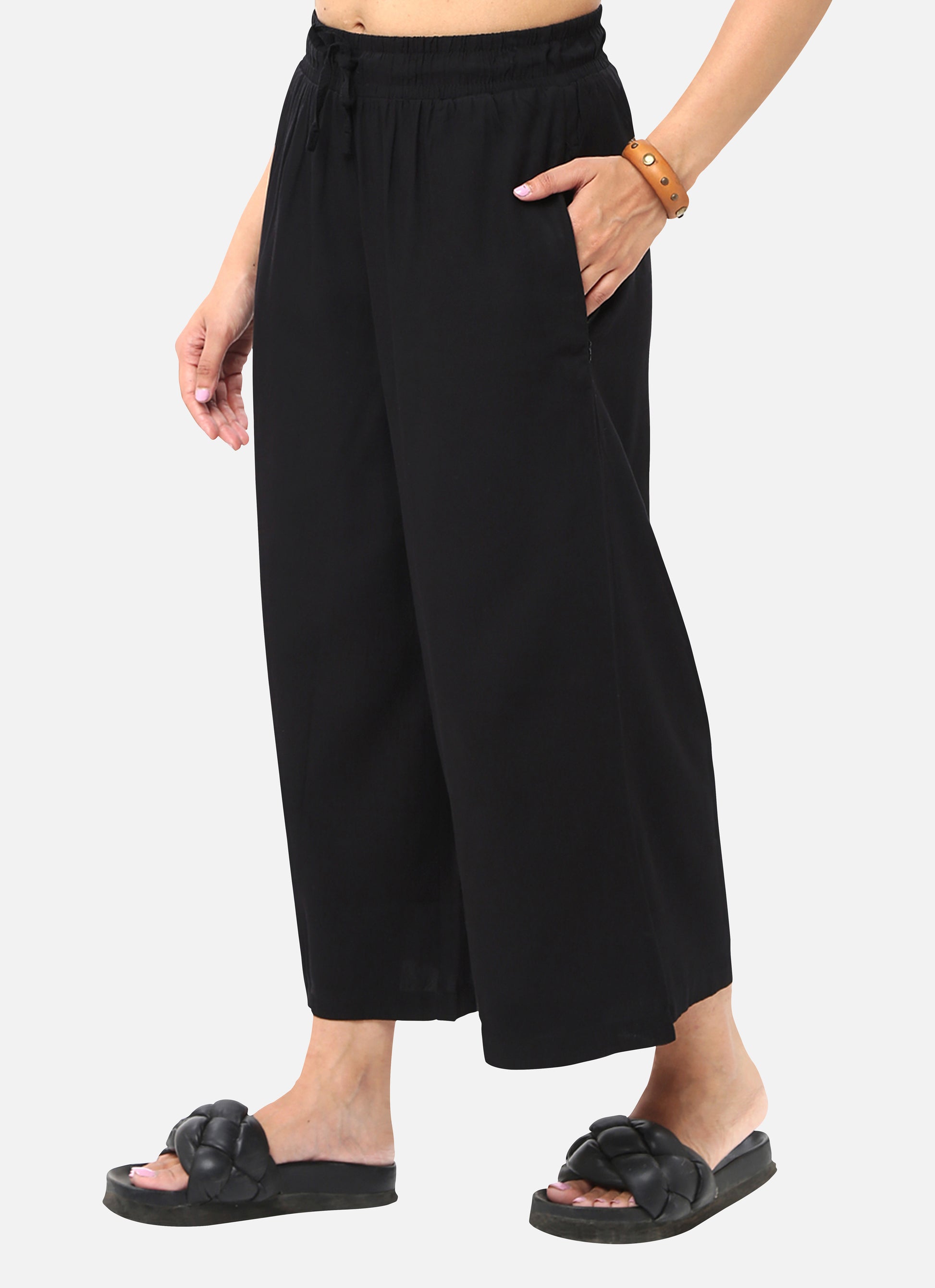 Womens bottom wear in deep black, designed for a chic and adaptable style, ideal for a range of occasions, available online