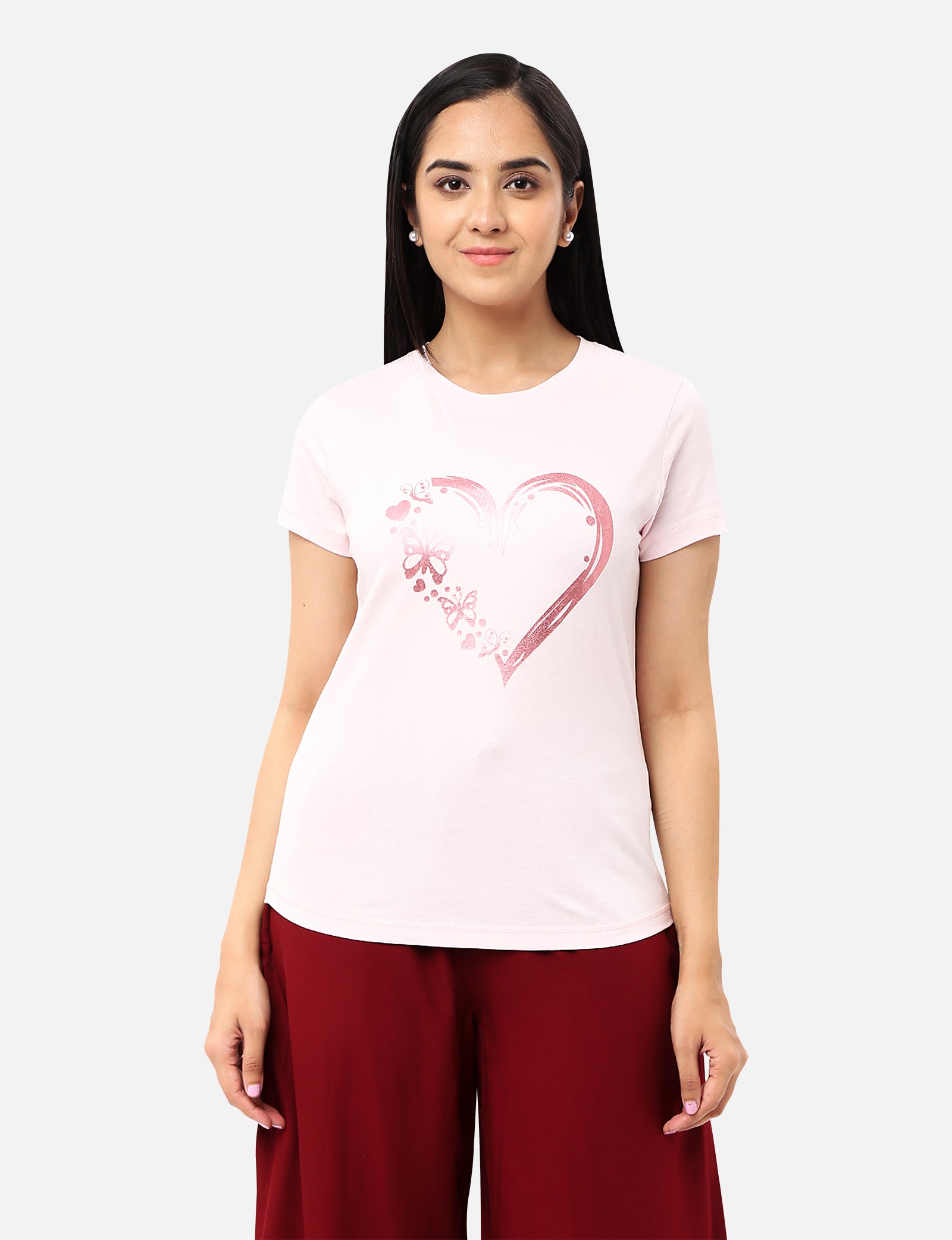 Womens light baby pink T-shirt featuring a glitter heart design, perfect for adding a touch of glamour to your wardrobe, available online