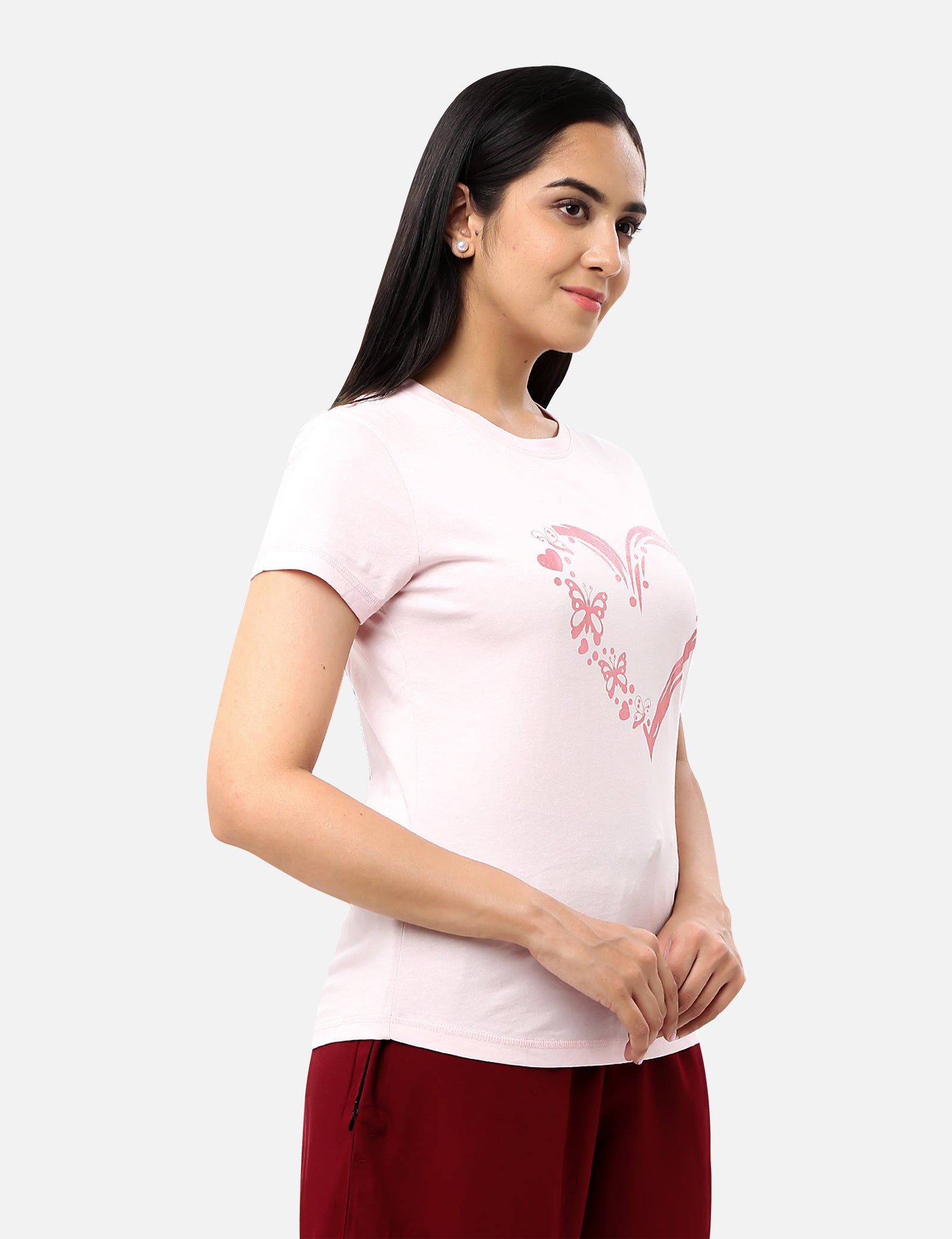 Womens light baby pink T-shirt featuring a glitter heart design, perfect for adding a touch of glamour to your wardrobe, available online