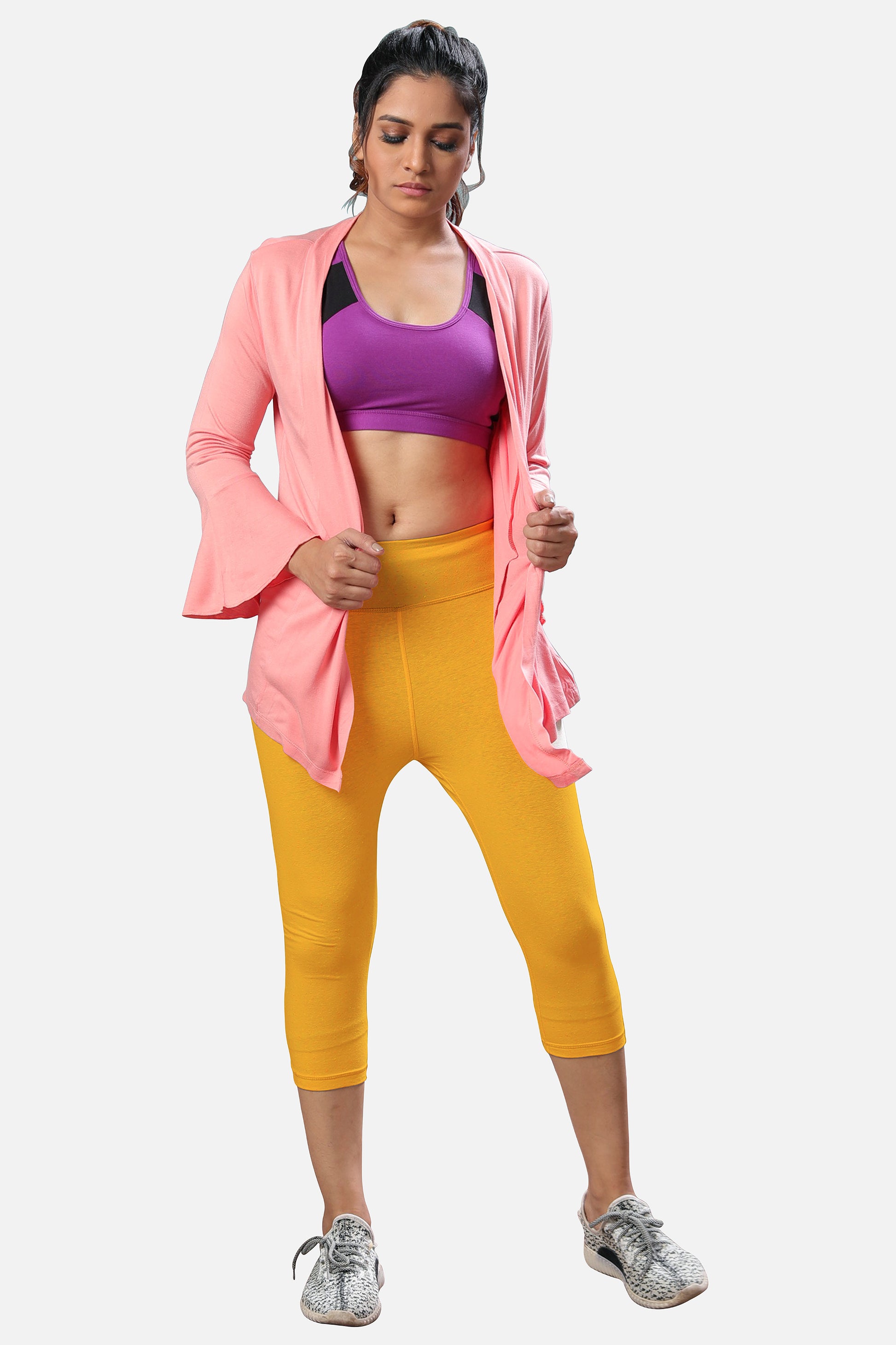 Buy womens mustard yellow capris online, featuring a fashionable design and flattering fit for any casual or smart-casual look