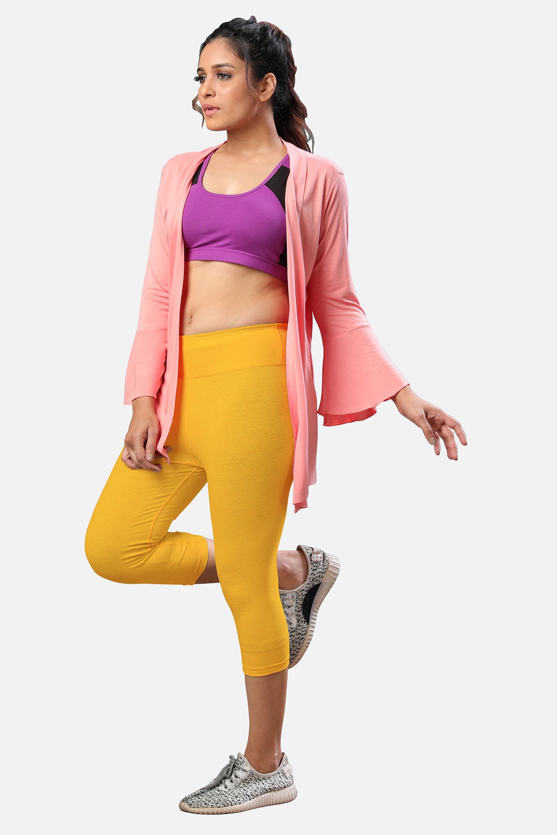 Buy womens mustard yellow capris online, featuring a fashionable design and flattering fit for any casual or smart-casual look