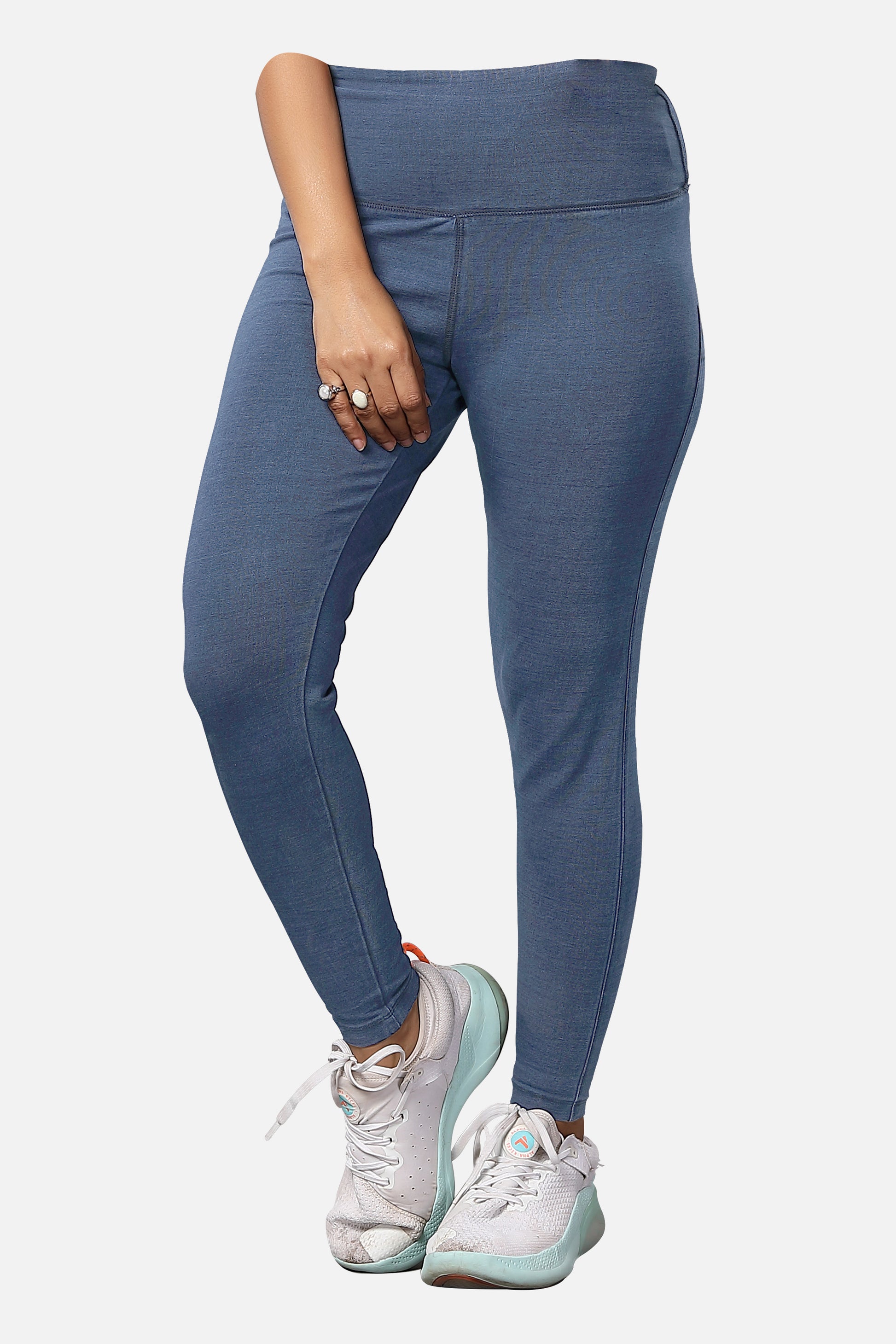 Shop womens knitted mid-blue denim jeggings, featuring a trendy design and a flattering fit, ideal for everyday fashion, available online