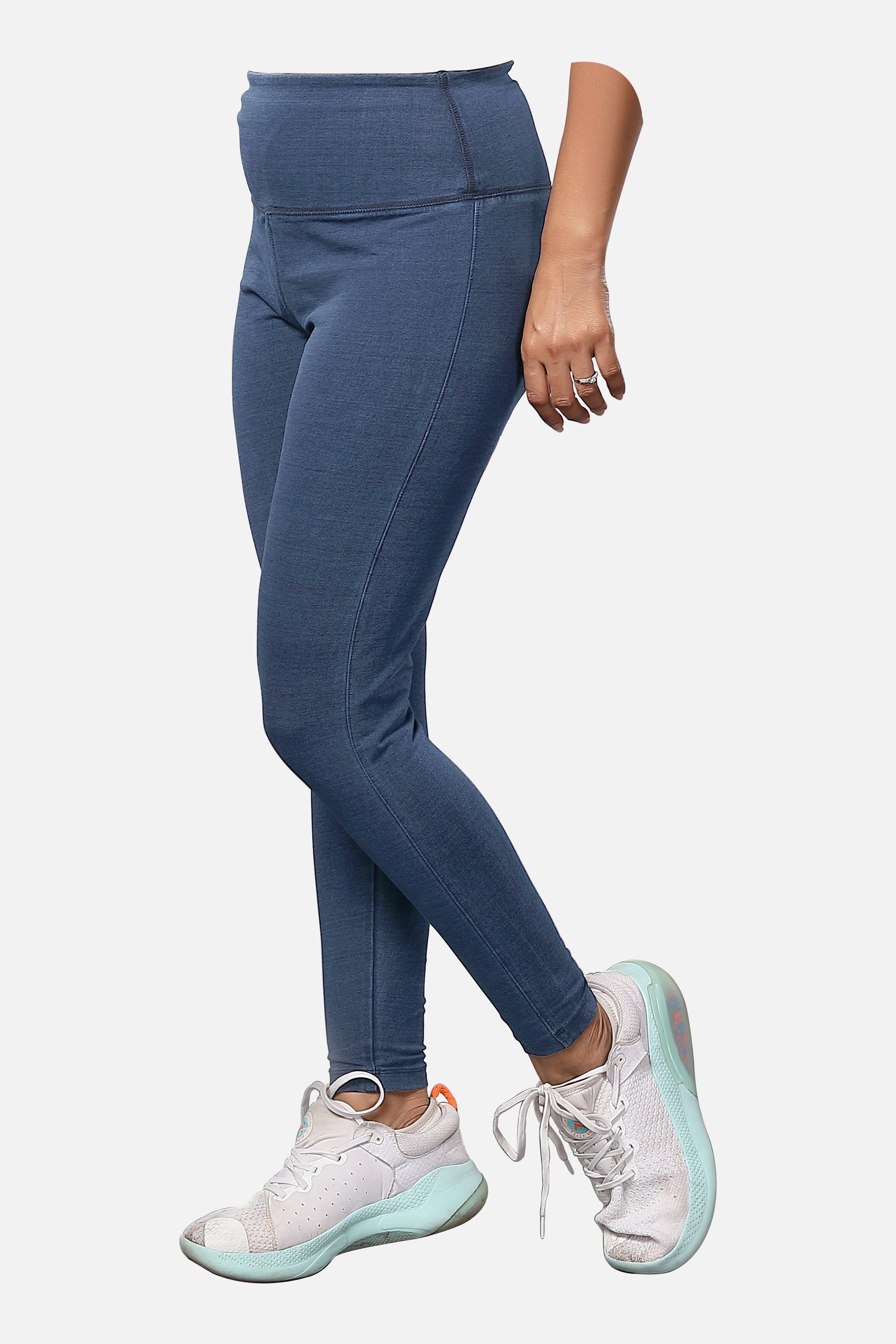 Shop womens knitted mid-blue denim jeggings, featuring a trendy design and a flattering fit, ideal for everyday fashion, available online